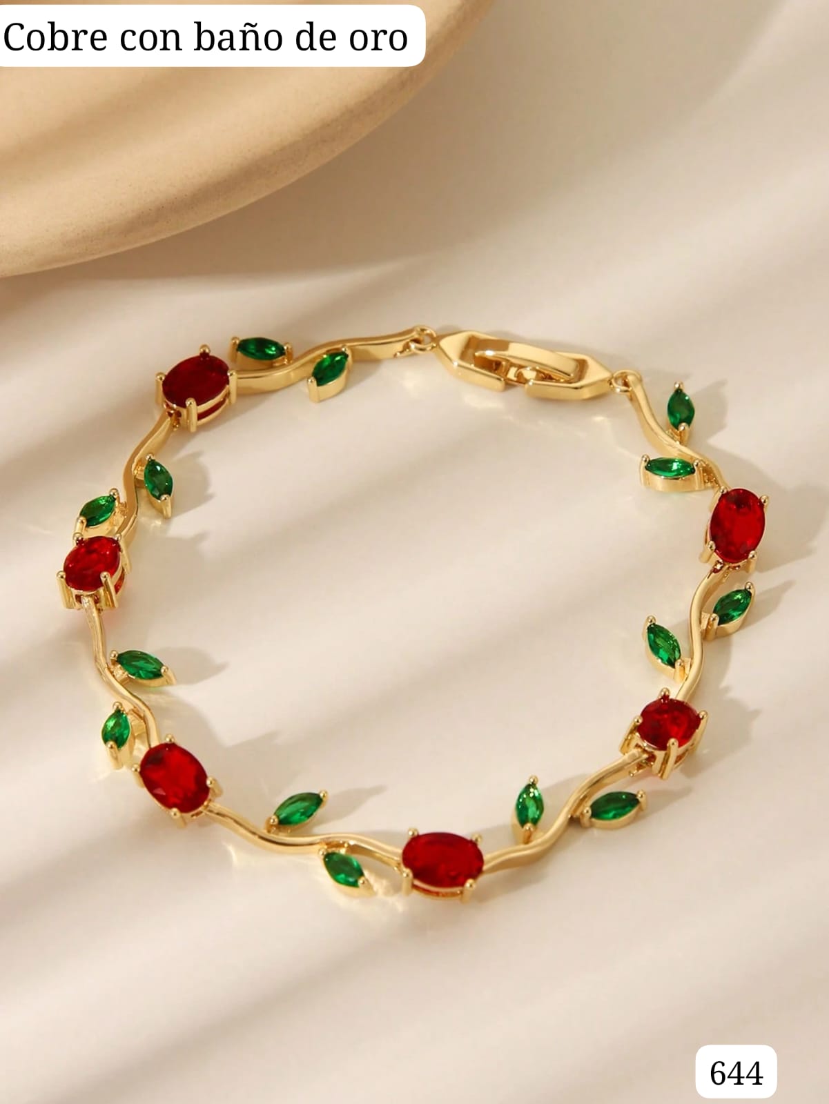 PULSERA DORADA CON FLORES ROJAS