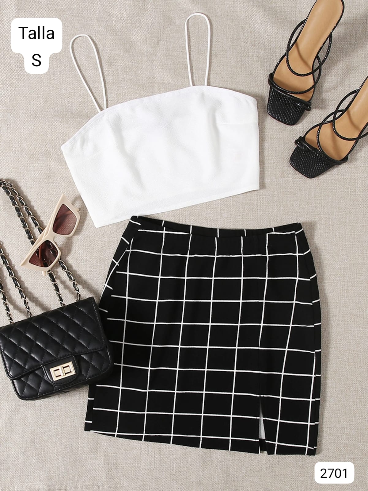 CONJUNTO DE TOP BLANCO Y FALDA NEGRA CON RAYAS