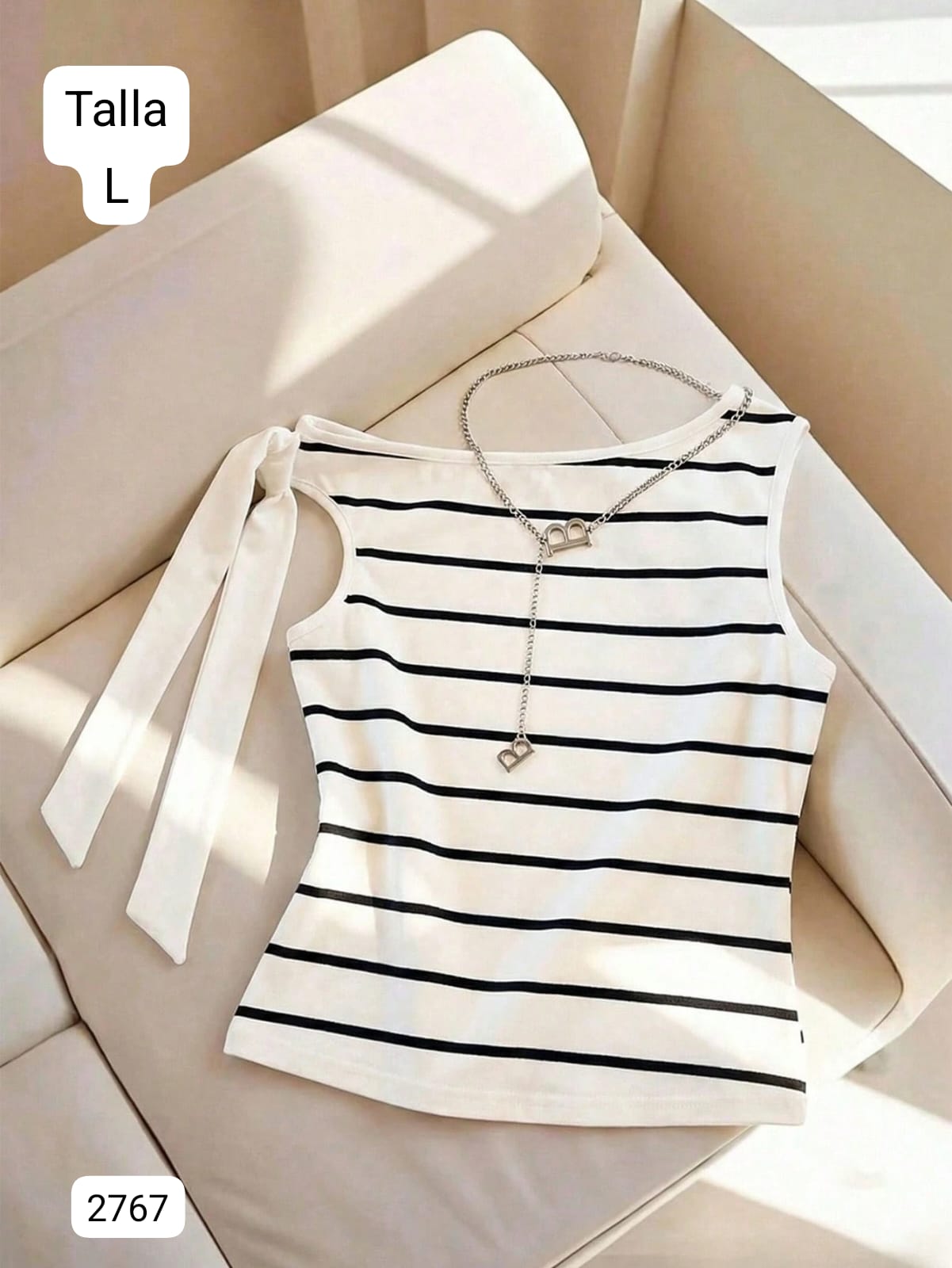 BLUSA CON LISTON EN UN LADO