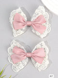 2 PARES DE GANCHOS DE PELO EN TONOS ROSA Y BLANCO