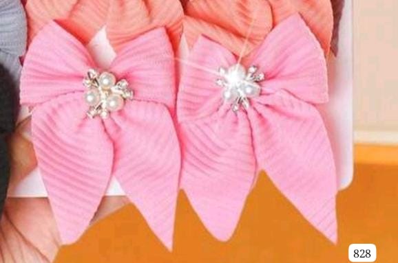 SET DE 2 GANCHITOS ROSADOS