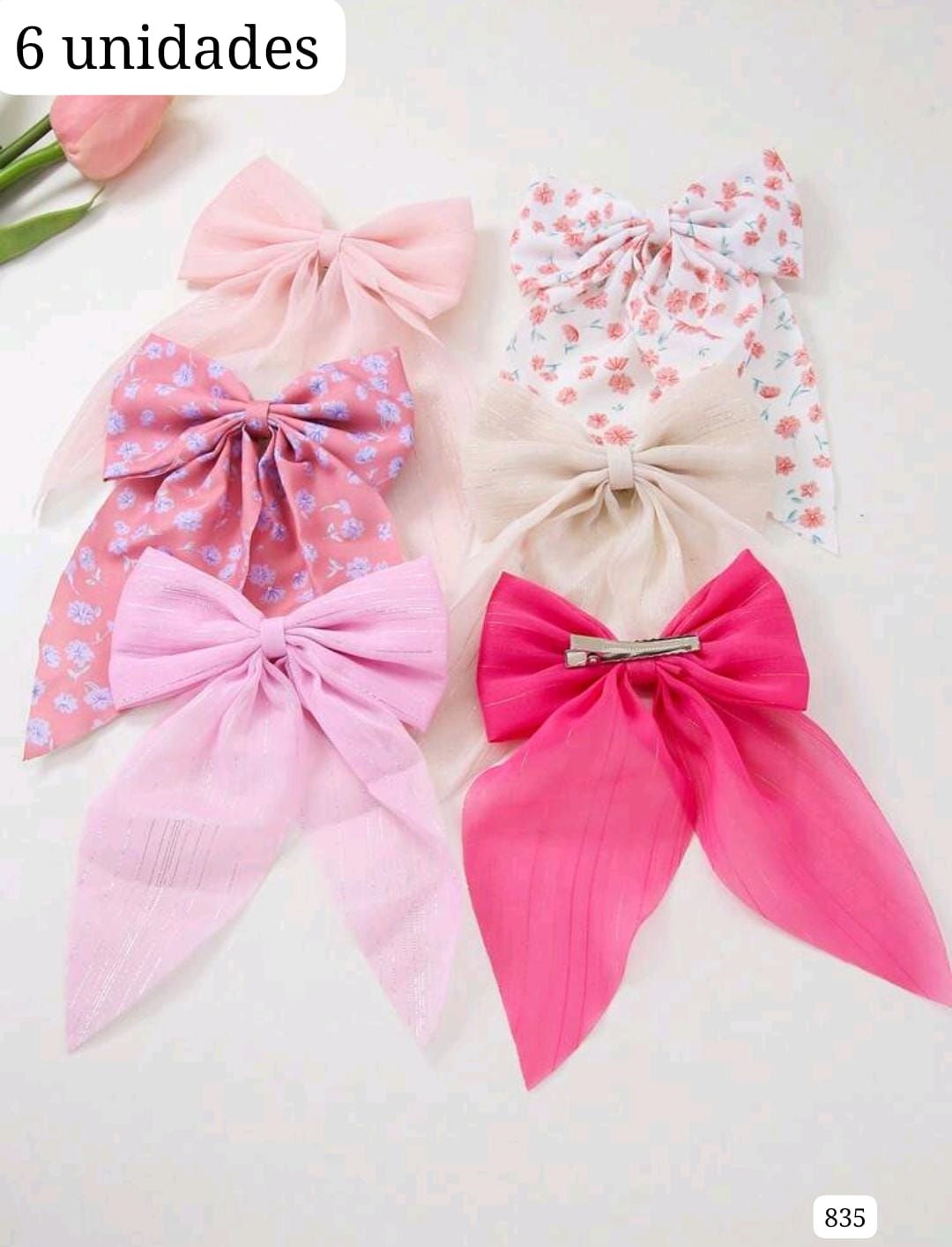 6 UNIDADES DE GANCHOS DE PELO EN TONOS ROSAS