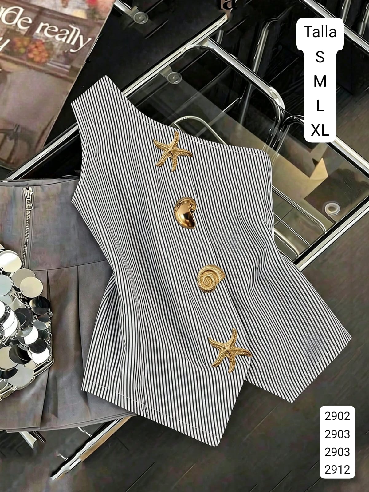 BLUSA RAYAS NEGRAS MANGA DIAGONAL CON DIJEN ESTILO MAR