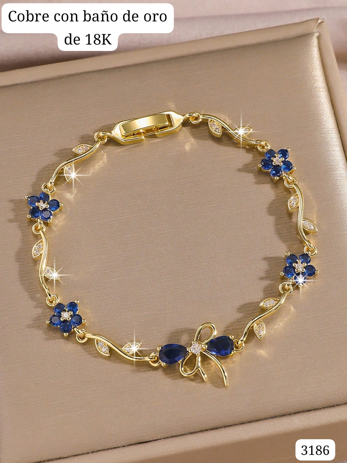 PULSERA DORADA CON AZUL DE MUJER