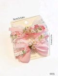 SET DE 2 GANCHOS EN TONOS ROSA CON PERLAS