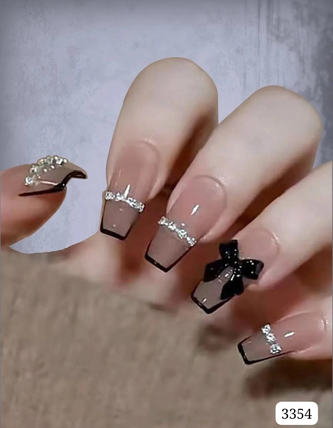 CAJITA DE UÑAS POSTIZAS