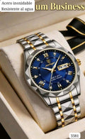 RELOJ PLATEADO CON DETALLES DORADOS Y AZUL DE HOMBRE