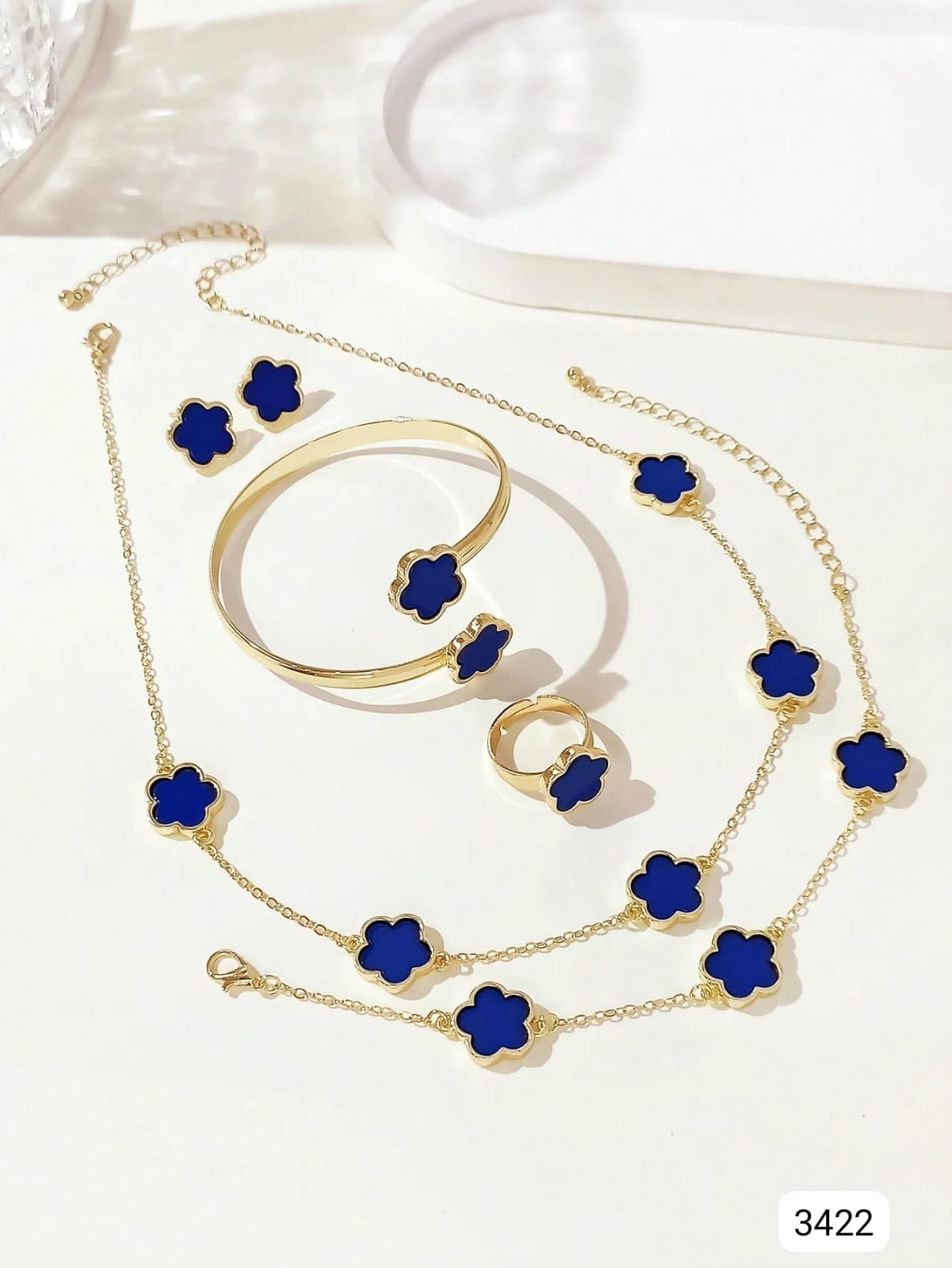 SET DE JOYERIA DORADA ESTILO FLORES AZULES