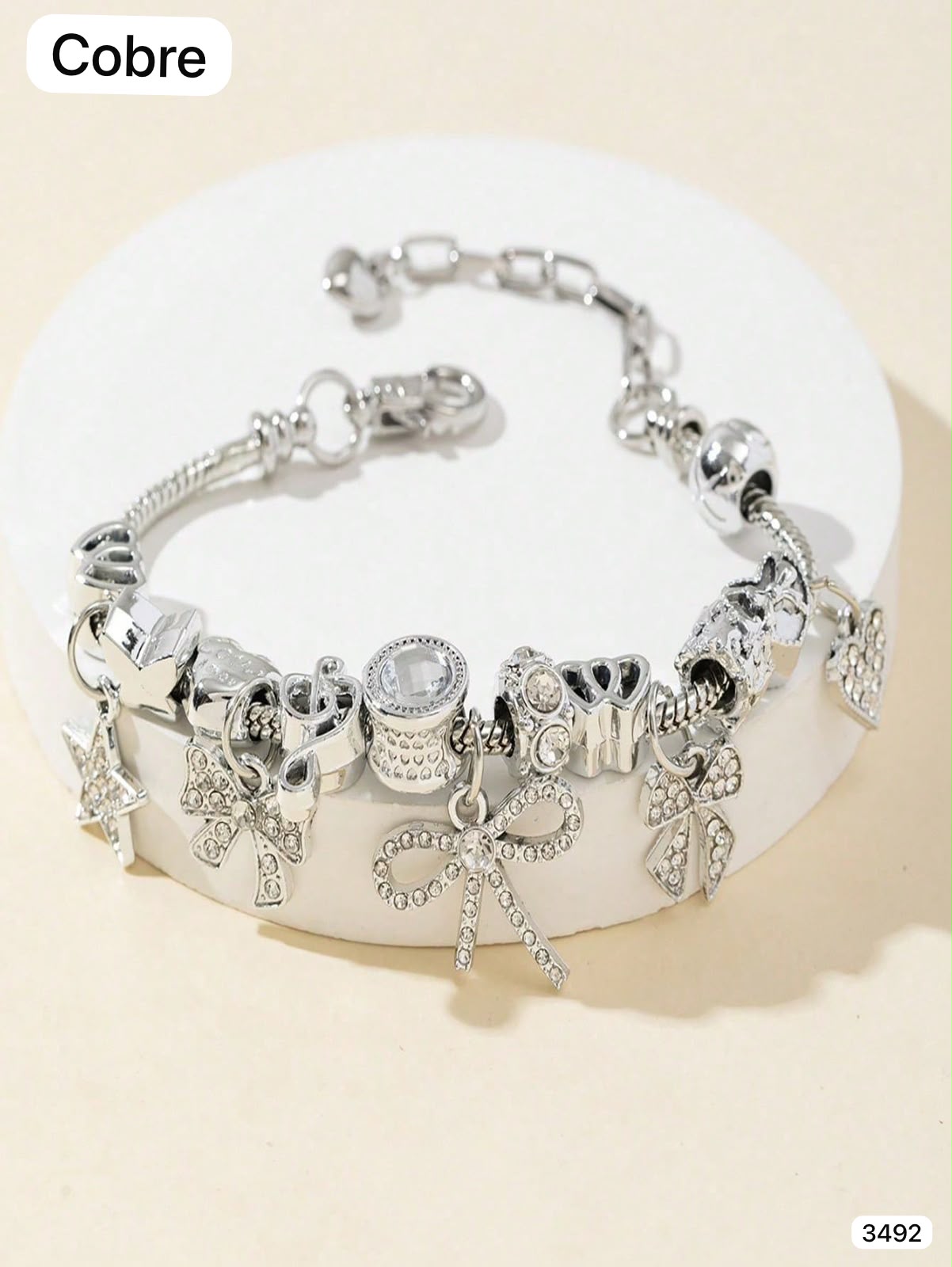 PULSERA PLATEADA CON DIJEN PLATEADOS