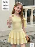 VESTIDO AMARILLO MANGA CAIDA CON FLOR METALICA DE NIÑA