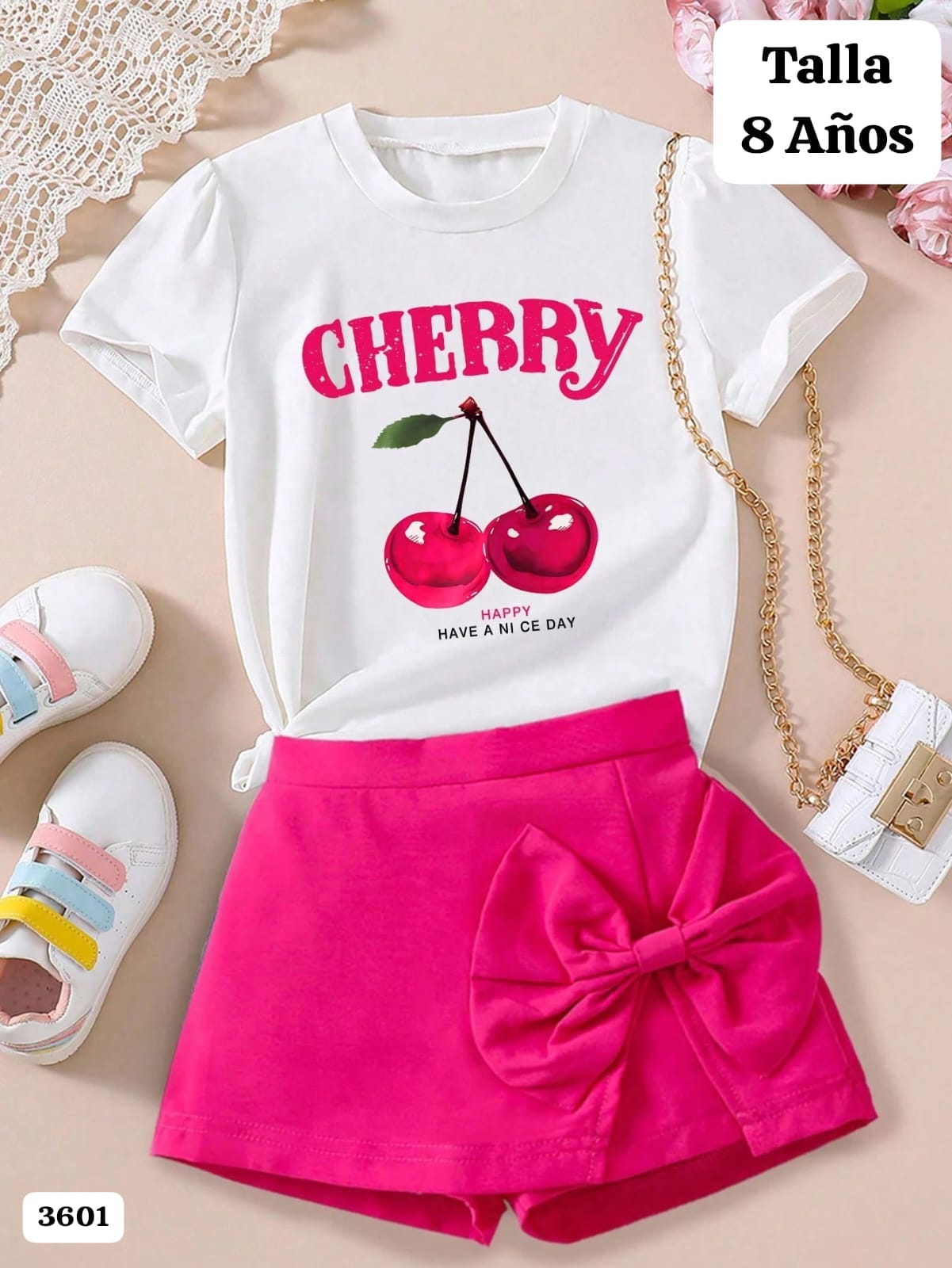 CONJUNTO DE CAMISETA BLANCA DE CHERRY Y FALDA ROSA DE NIÑA