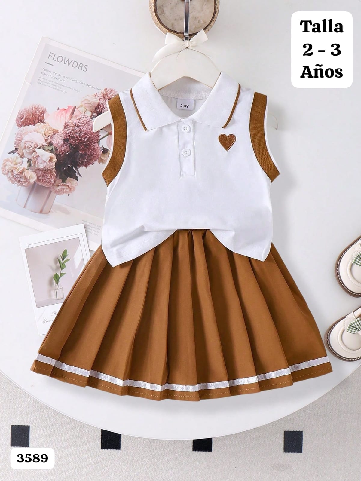 CONJUNTO DE CAMISA SIN MANGAS Y FALDA DE NIÑA