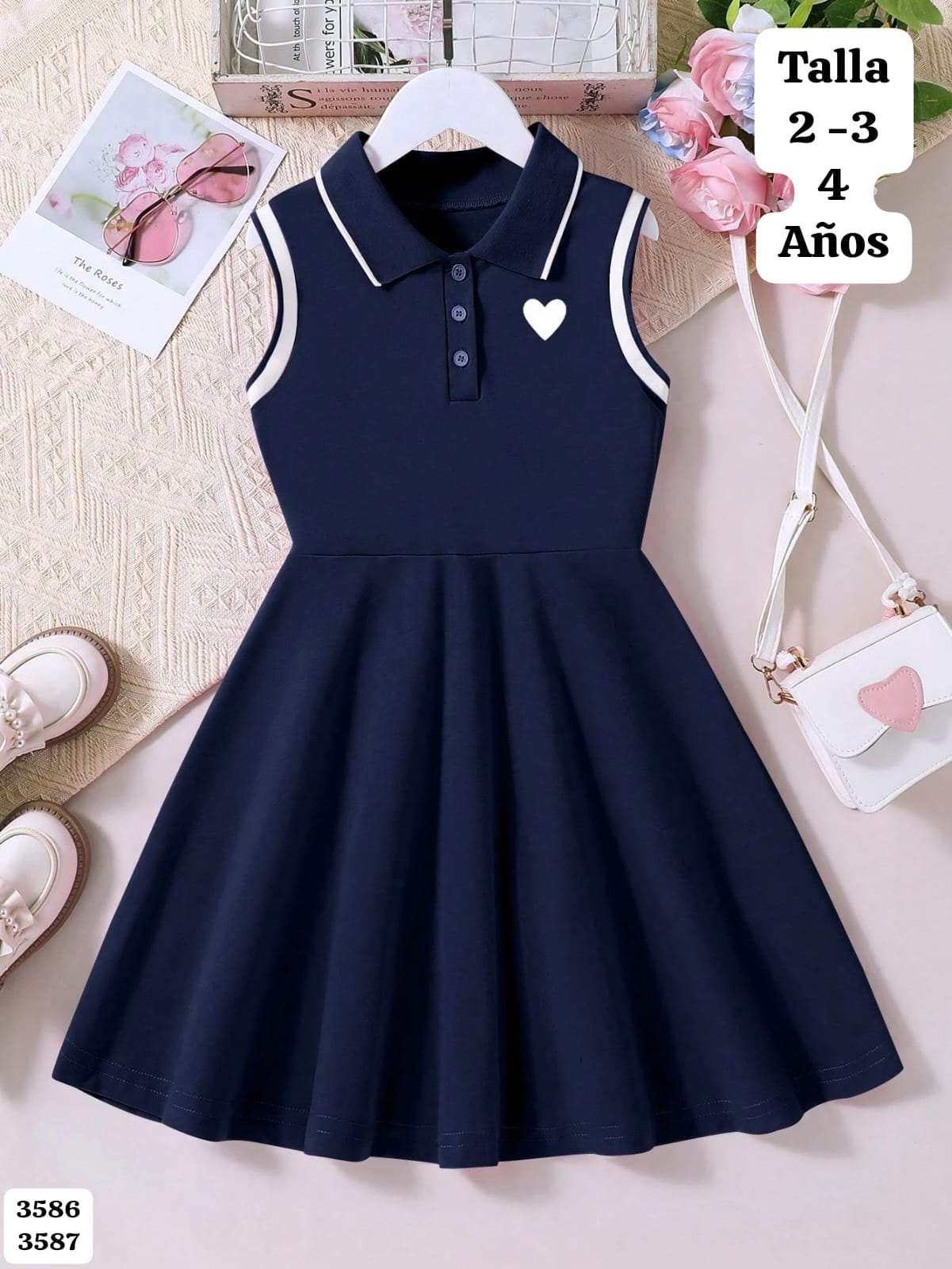 VESTIDO AZUL CON CORAZON BLANCO DE NIÑA