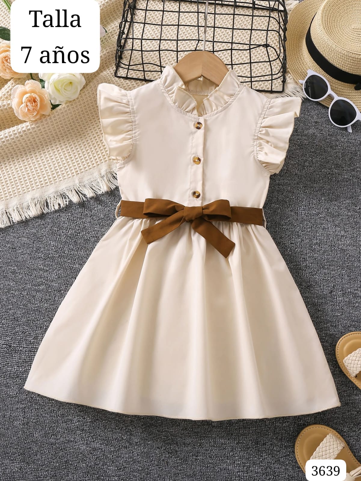 VESTIDO BEIGE DE BOTONES DE NIÑA