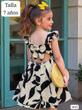 VESTIDO BEIGE Y NEGRO CON DETALLE DE CHONGO EN LA ESPALDA DE NIÑA