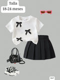 CAMISA BLANCA CON CHONGOS NEGROS Y FALDA NEGRA DE NIÑA