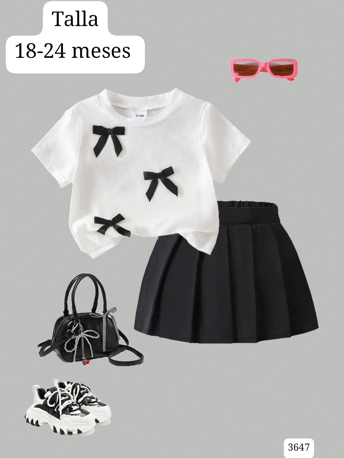 CAMISA BLANCA CON CHONGOS NEGROS Y FALDA NEGRA DE NIÑA