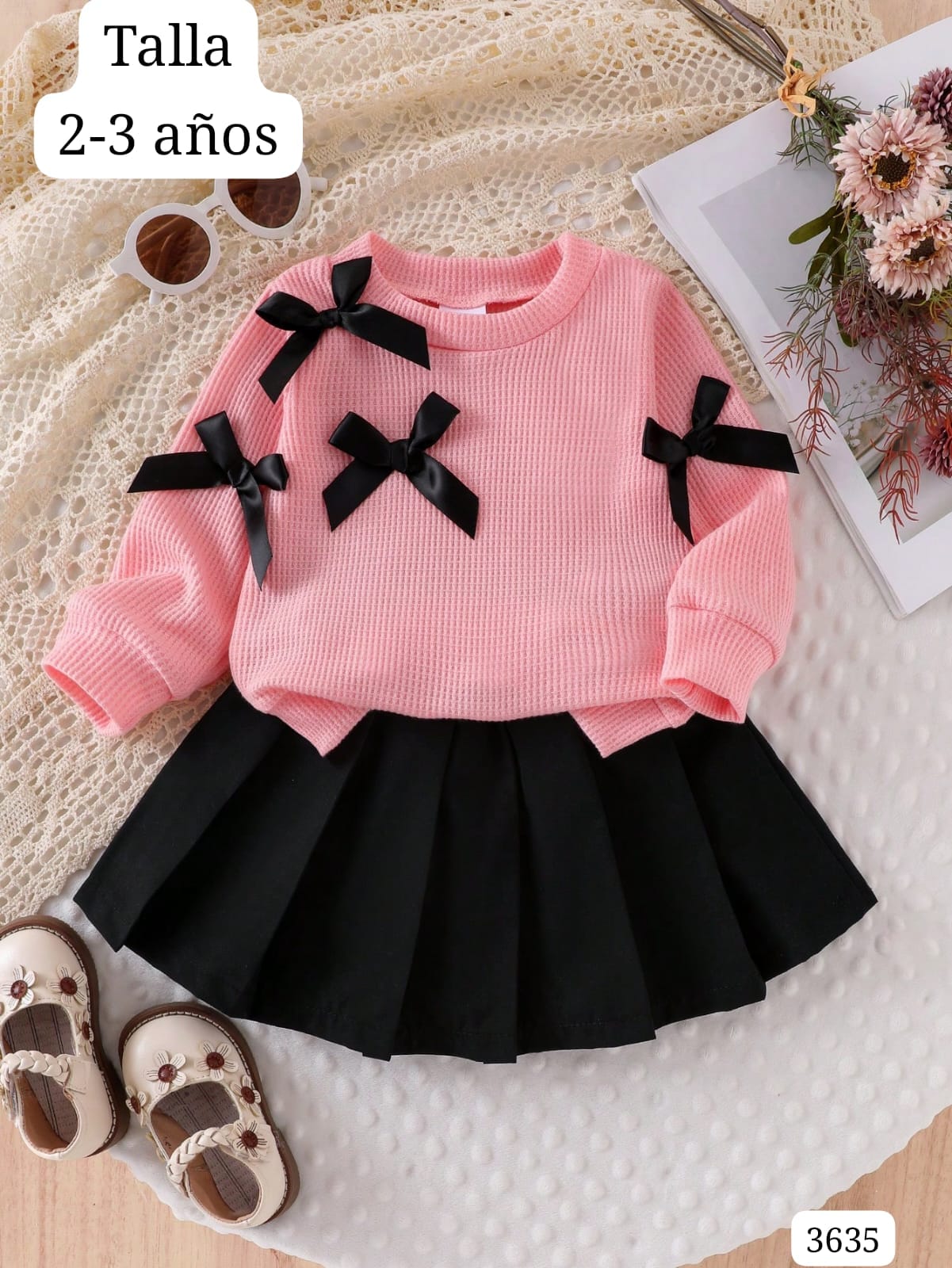 CONJUNTO DE SUDADERA ROSA Y FALDA NEGRA DE NIÑA