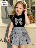 CONJUNTO DE FALDA Y CAMISA NEGRA DE NIÑA