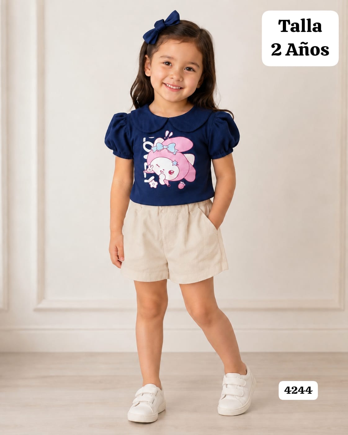 CONJUNTO DE BLUSA AZUL Y SHORT BEIGE DE NIÑA
