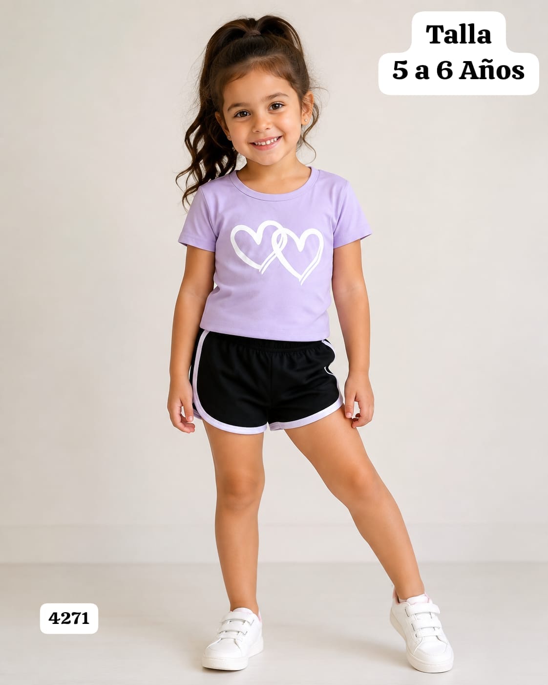 CONJUNTO DE CAMISA MORADA Y SHORT NEGRO DE NIÑA
