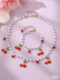 SET DE COLLAR Y PULSUERA DE PERLAS BLANCAS Y CEREZAS