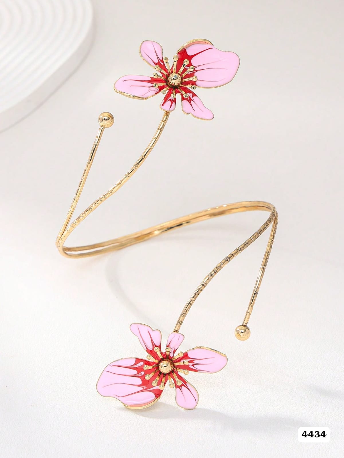 BRAZALETE DORADO CON FLORES