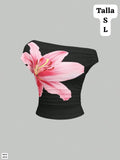 TOP ASIMETRICO NEGRO CON FLOR ROSA DE MUJER