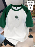CAMISETA RAGLÀN CON MUÑECO EN ENREDO DE HOMBRE