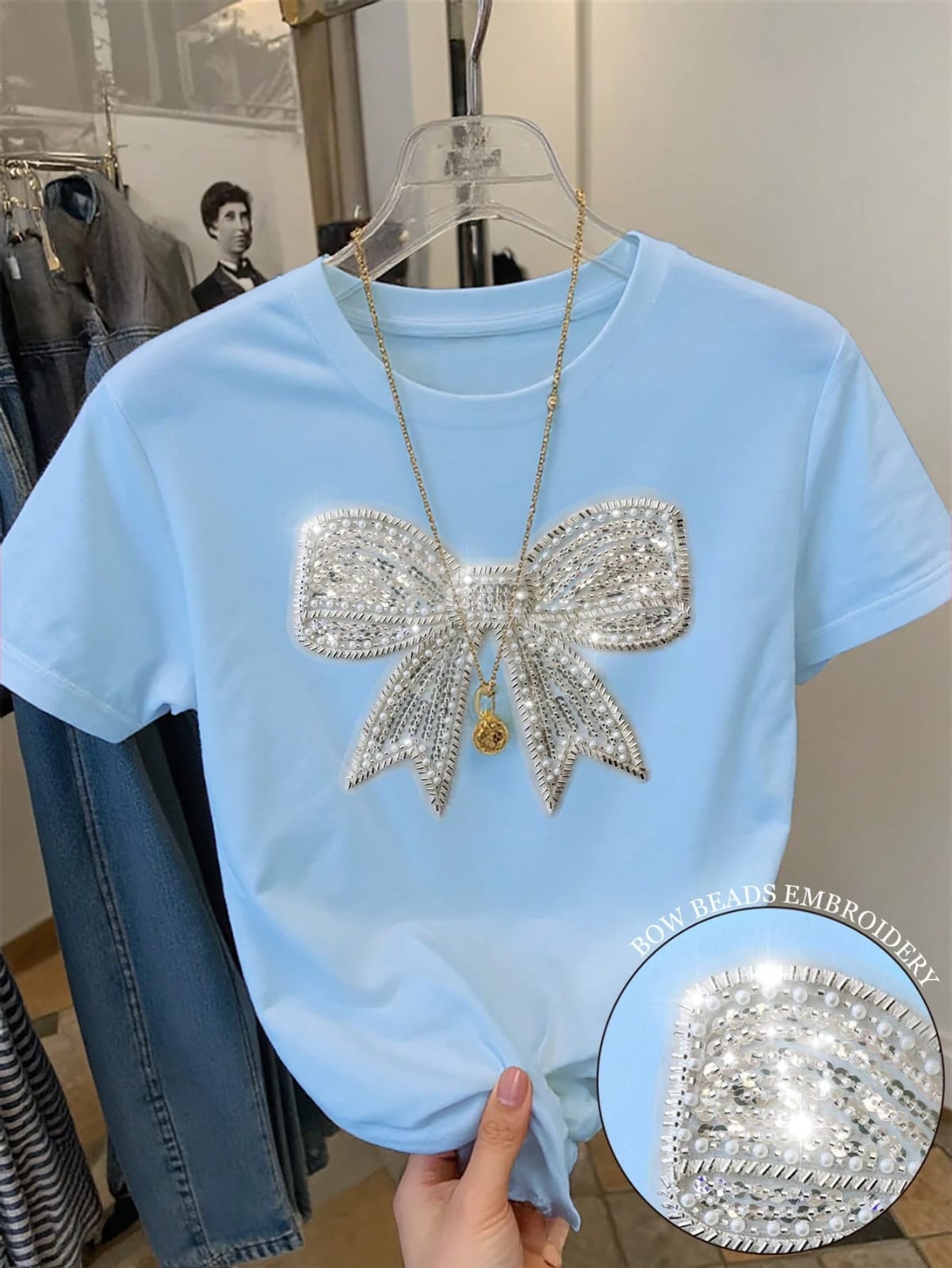 CAMISA DE MUJER CON DISEÑO DE CHONGO