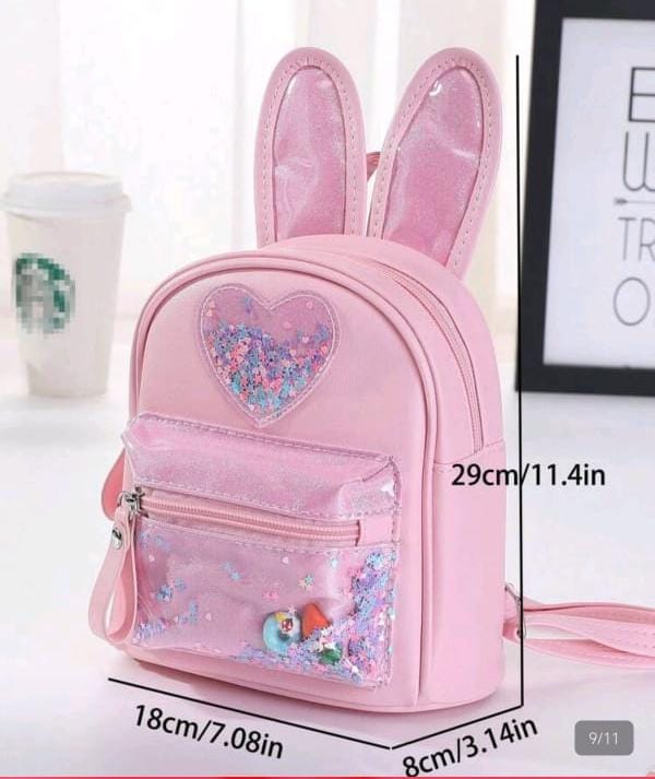 MOCHILA CON LENTEJUELA DE CONEJO