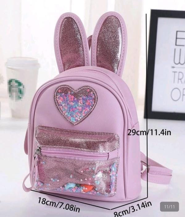 MOCHILA CON LENTEJUELA DE CONEJO