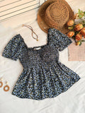TOP CON MANGAS DE FLORES