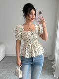 CAMISA COLOR AMARILLO CON FLORES ROJAS DE MUJER